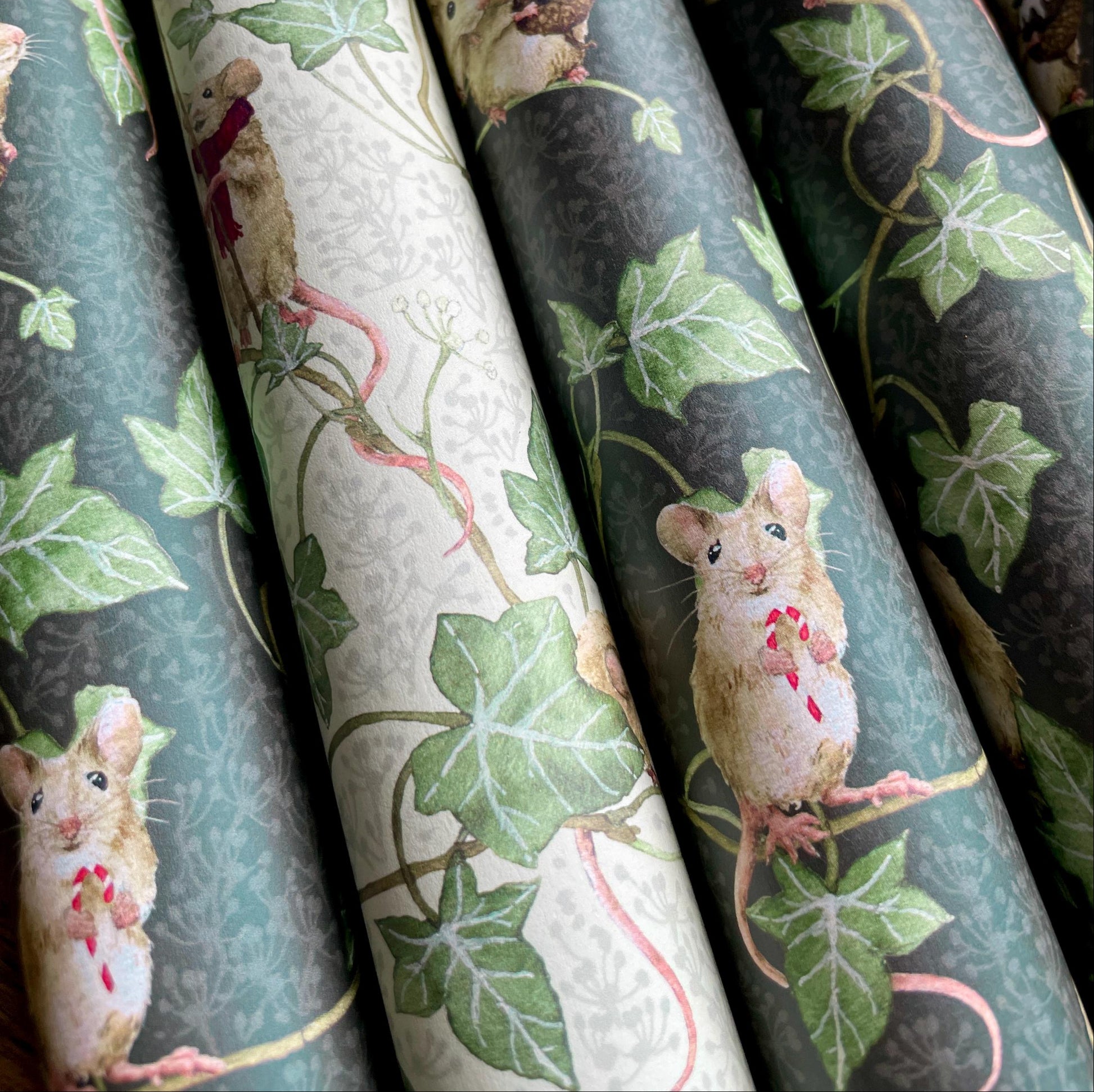Rolls of decorative paper with mouse and leaf patterns
