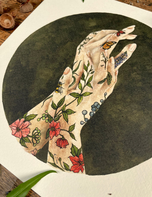 Artistic depiction of a hand with floral and butterfly tattoos on a dark background